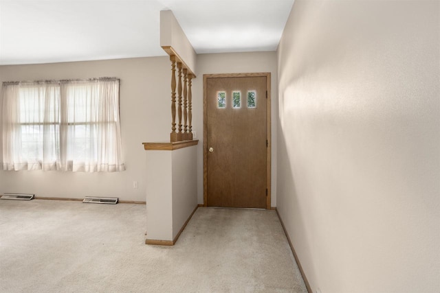 1054 Oxford Ct, Neenah, WI 54956 - entryway with baseboards and carpet