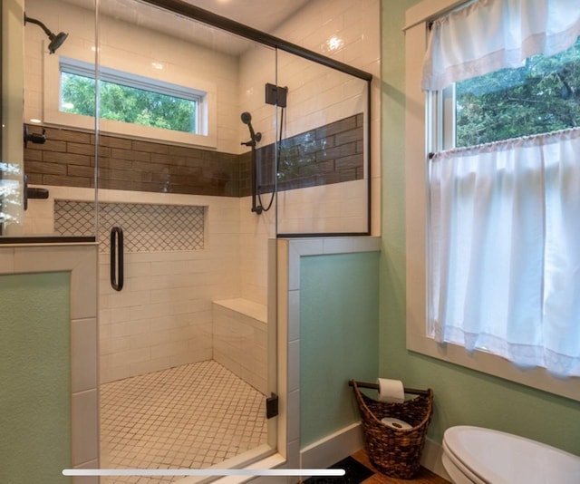 76 Hillside Rd, Edgerton, WI 53534 - bathroom featuring toilet and a stall shower