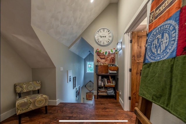 76 Hillside Rd, Edgerton, WI 53534 - foyer with lofted ceiling, wood finished floors, and baseboards