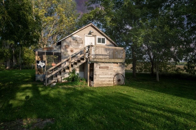 76 Hillside Rd, Edgerton, WI 53534 - rear view of property featuring stairway, a yard, and a deck