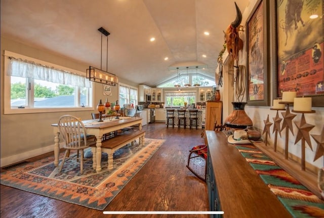 76 Hillside Rd, Edgerton, WI 53534 - dining space with lofted ceiling, dark wood-type flooring, baseboards, and recessed lighting
