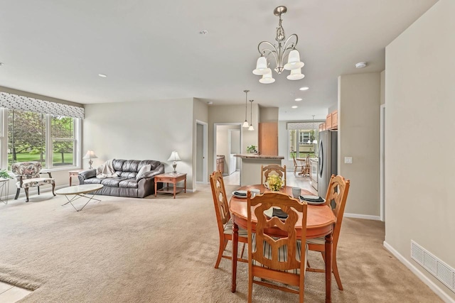 8687 S Deerwood Ln, Franklin, WI 53132 - dining area featuring light colored carpet, baseboards, a chandelier, and recessed lighting