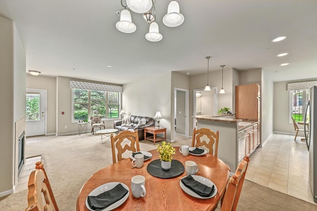 8687 S Deerwood Ln, Franklin, WI 53132 - dining room featuring light carpet, baseboards, recessed lighting, and a chandelier