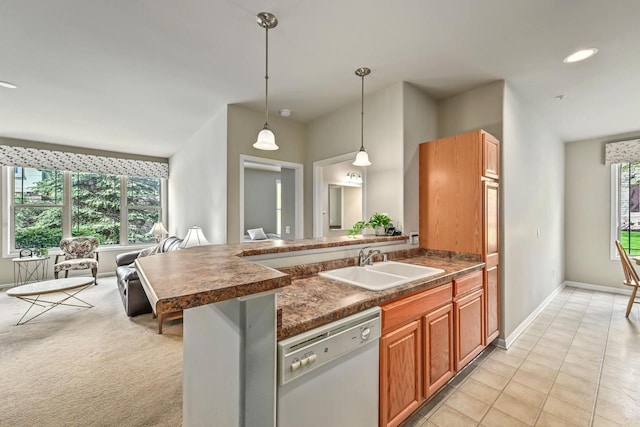8687 S Deerwood Ln, Franklin, WI 53132 - kitchen featuring white dishwasher, a sink, dark countertops, decorative light fixtures, and recessed lighting