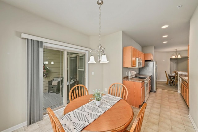 8687 S Deerwood Ln, Franklin, WI 53132 - dining room with a chandelier, baseboards, light tile patterned floors, and recessed lighting