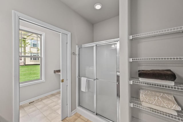 8687 S Deerwood Ln, Franklin, WI 53132 - bathroom with a stall shower and baseboards