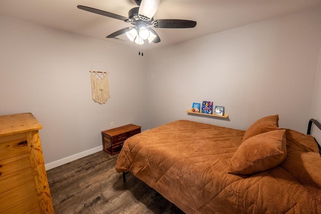S1579 Butler Rd, Hillsboro, WI 54634 - bedroom featuring dark wood-type flooring, baseboards, and ceiling fan