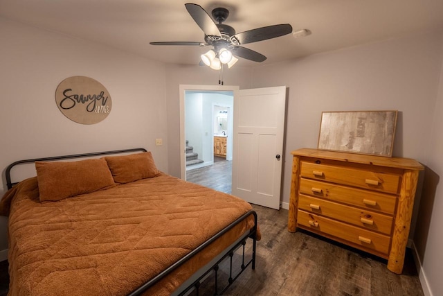 S1579 Butler Rd, Hillsboro, WI 54634 - bedroom with dark wood-style floors, baseboards, and a ceiling fan