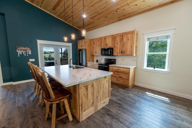 S1579 Butler Rd, Hillsboro, WI 54634 - kitchen with black appliances, wood ceiling, a sink, a kitchen island with sink, and french doors