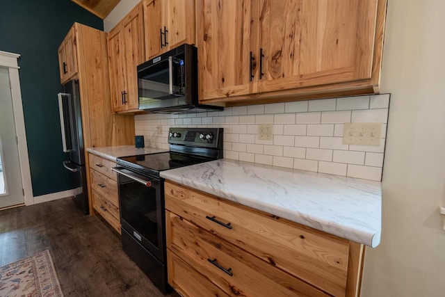 S1579 Butler Rd, Hillsboro, WI 54634 - kitchen with black appliances, dark wood-style flooring, decorative backsplash, and light stone counters
