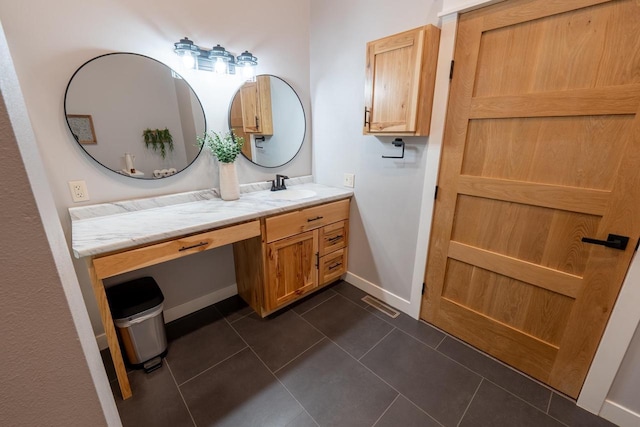 S1579 Butler Rd, Hillsboro, WI 54634 - bathroom featuring vanity, tile patterned floors, and baseboards