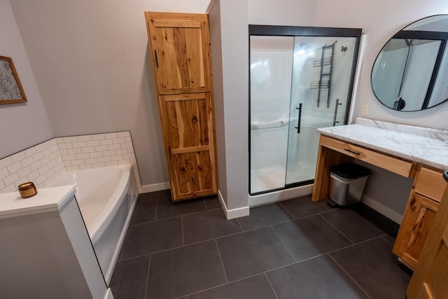 S1579 Butler Rd, Hillsboro, WI 54634 - bathroom with a stall shower, a garden tub, tile patterned flooring, and vanity