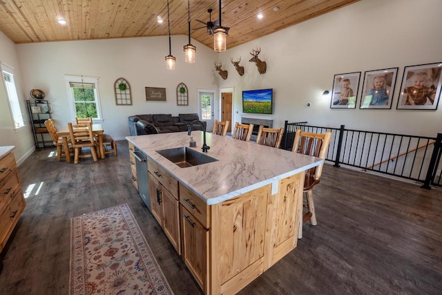 S1579 Butler Rd, Hillsboro, WI 54634 - kitchen with a sink, wood ceiling, dark wood finished floors, recessed lighting, and a kitchen bar