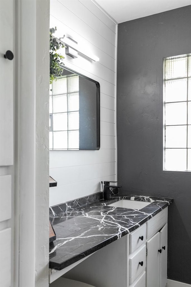 751 Warsaw St, Menasha, WI 54952 - bathroom with vanity and healthy amount of natural light