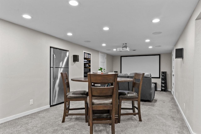 751 Warsaw St, Menasha, WI 54952 - home theater room featuring light carpet, recessed lighting, and baseboards