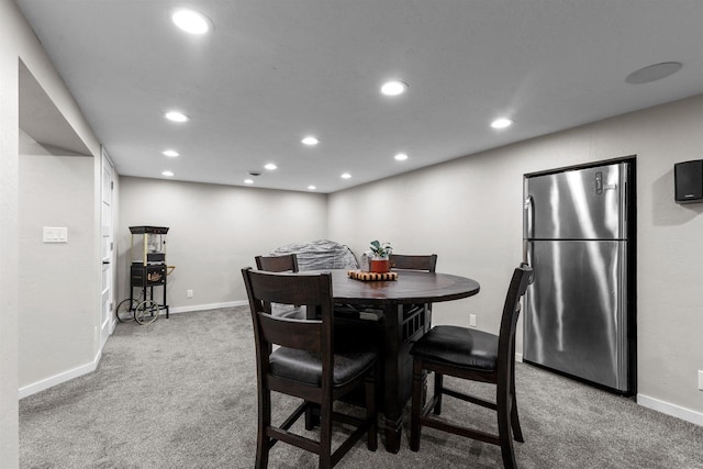 751 Warsaw St, Menasha, WI 54952 - dining space with light colored carpet, recessed lighting, and baseboards