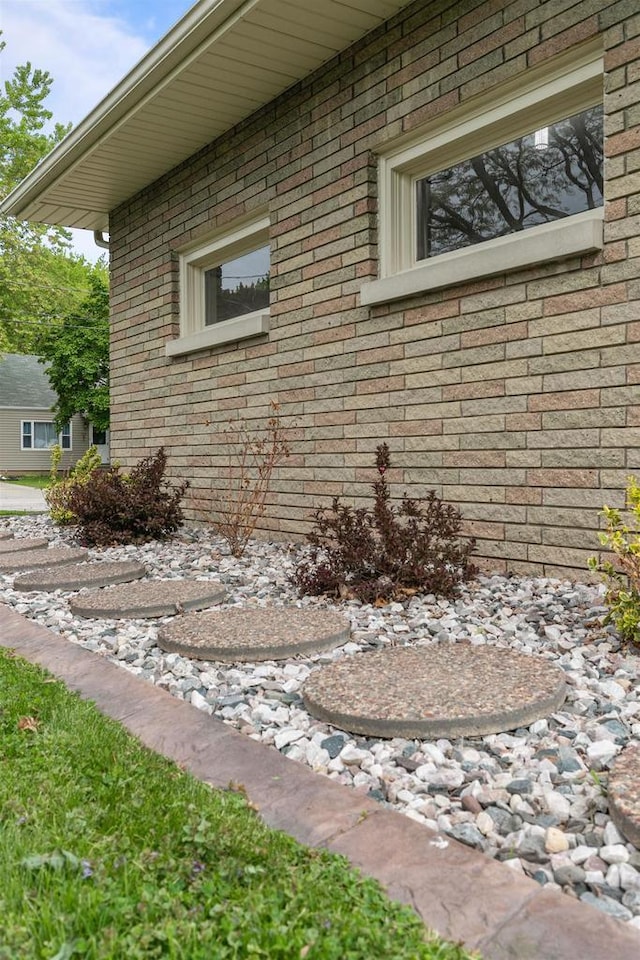 751 Warsaw St, Menasha, WI 54952 - view of side of home featuring brick siding