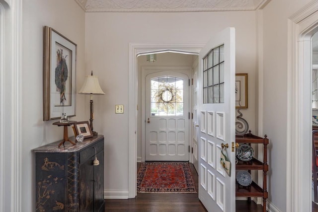 1030 Washington Ave, Oshkosh, WI 54901 - foyer with dark wood-type flooring and baseboards
