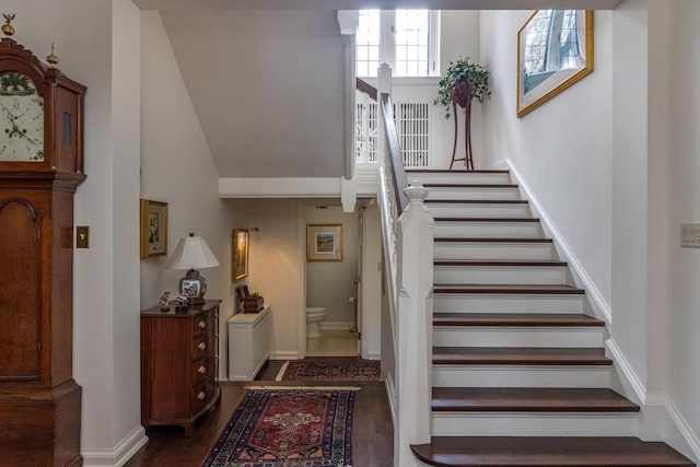 1030 Washington Ave, Oshkosh, WI 54901 - staircase featuring wood finished floors and baseboards