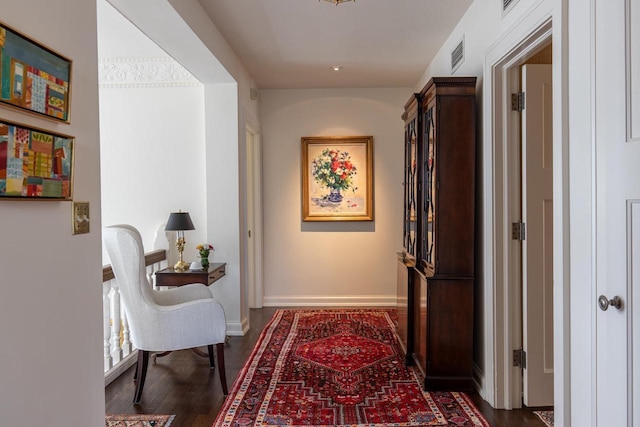 1030 Washington Ave, Oshkosh, WI 54901 - corridor with dark wood-style flooring and baseboards