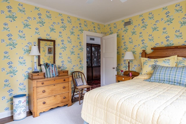 1030 Washington Ave, Oshkosh, WI 54901 - bedroom featuring wallpapered walls, ornamental molding, and light carpet