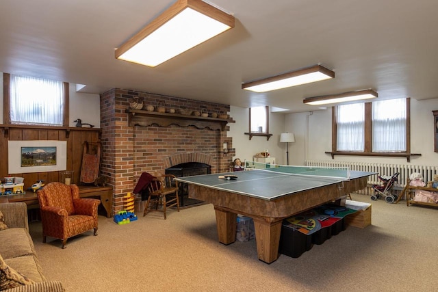 1030 Washington Ave, Oshkosh, WI 54901 - recreation room with carpet flooring, a brick fireplace, and plenty of natural light