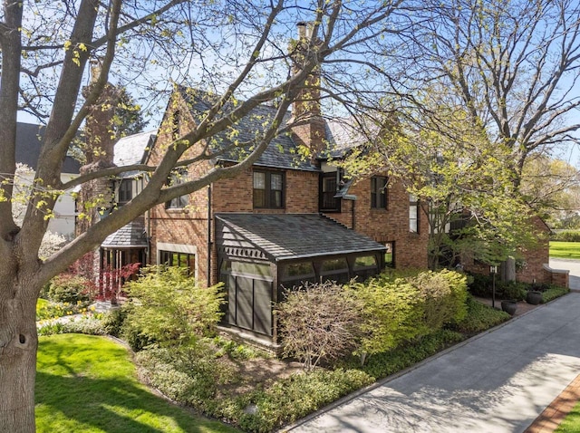 1030 Washington Ave, Oshkosh, WI 54901 - view of home's exterior featuring brick siding