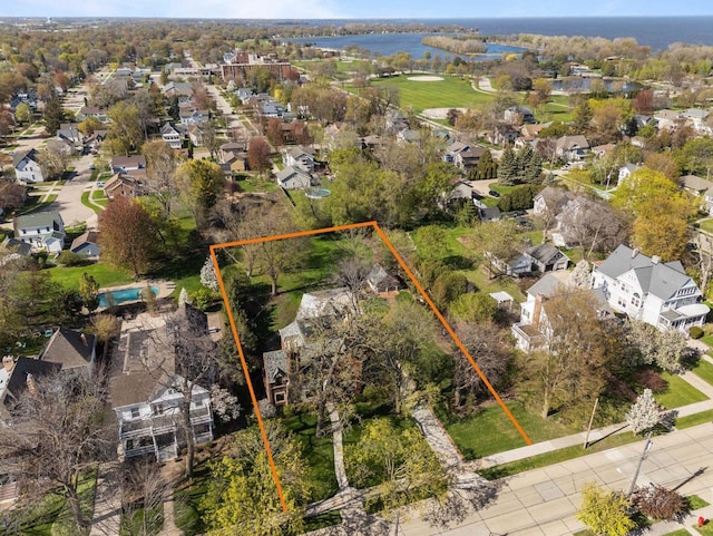 1030 Washington Ave, Oshkosh, WI 54901 - aerial view of residential area featuring property parcel outlined and a large body of water