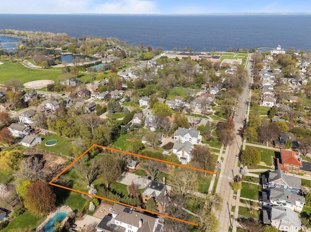 1030 Washington Ave, Oshkosh, WI 54901 - aerial perspective of suburban area with a nearby body of water and property parcel outlined