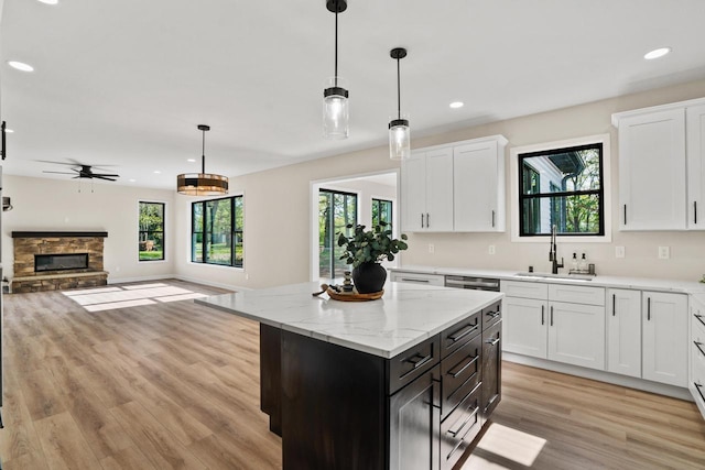 11715 45th Ave, Pleasant Prairie, WI 53158 - kitchen featuring a sink, light wood-type flooring, plenty of natural light, white cabinets, and recessed lighting