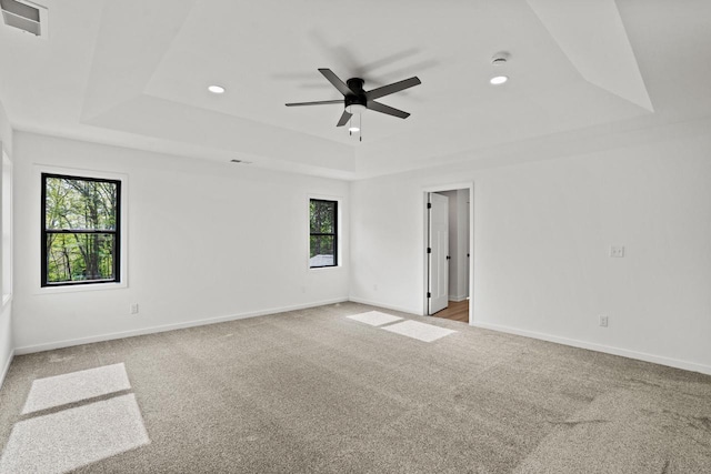 11715 45th Ave, Pleasant Prairie, WI 53158 - carpeted spare room with a tray ceiling, ceiling fan, recessed lighting, and baseboards