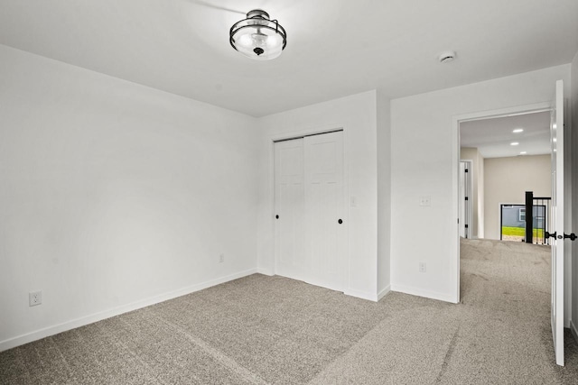 11715 45th Ave, Pleasant Prairie, WI 53158 - unfurnished bedroom with carpet floors, a closet, baseboards, and recessed lighting