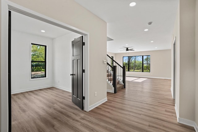 11715 45th Ave, Pleasant Prairie, WI 53158 - hall featuring plenty of natural light, wood finished floors, stairway, and recessed lighting