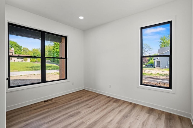 11715 45th Ave, Pleasant Prairie, WI 53158 - empty room with light wood-type flooring, baseboards, and recessed lighting