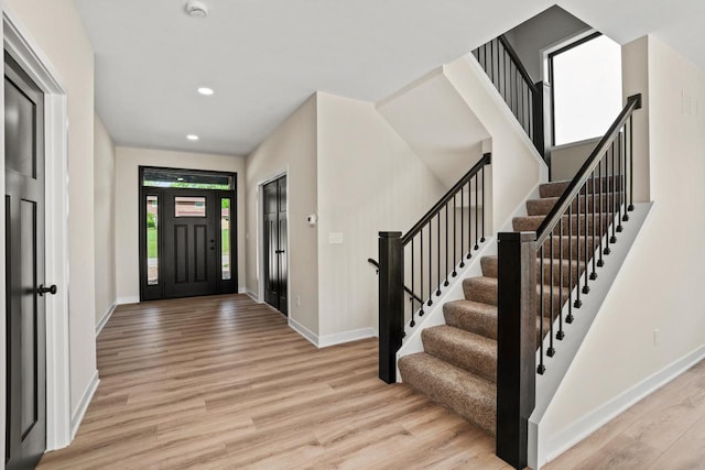 11715 45th Ave, Pleasant Prairie, WI 53158 - entryway with light wood finished floors, stairs, baseboards, and recessed lighting