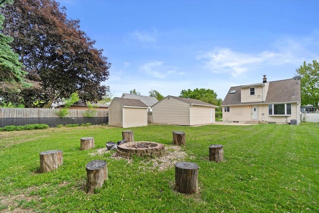 8706 W Arthur Ave, West Allis, WI 53227 - view of yard with a fire pit, entry steps, a patio area, and central AC