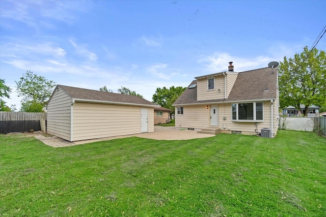 8706 W Arthur Ave, West Allis, WI 53227 - back of house featuring an outbuilding, a patio area, a chimney, and entry steps