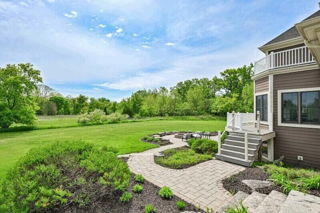 W292S5474 Fox Run Ct, Waukesha, WI 53189 - view of grassy yard with an outdoor fire pit, a patio area, and a deck