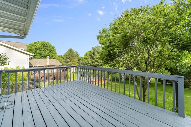 812 Clover Ln, Deforest, WI 53532 - wooden deck with a lawn