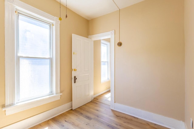 1031 S 15th St, Milwaukee, WI 53204 - foyer with light wood-type flooring and baseboards