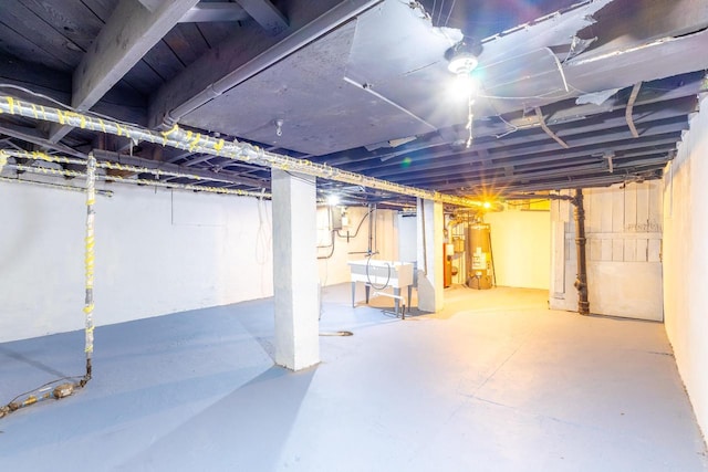 1031 S 15th St, Milwaukee, WI 53204 - unfinished below grade area with a sink and water heater