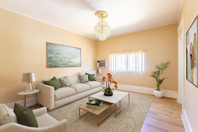 1031 S 15th St, Milwaukee, WI 53204 - living area with wood finished floors, a chandelier, and baseboards