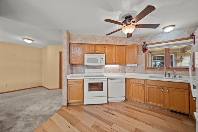 W159N4835 Graysland Dr Unit E, Menomonee Falls, WI 53051 - kitchen with white appliances, a sink, ceiling fan, and light countertops