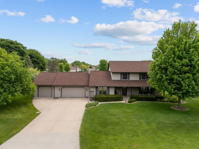 3226 W Twin Willow Ct, Appleton, WI 54914 - view of front of home featuring concrete driveway, a front yard, a garage, and roof with shingles