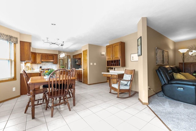 3226 W Twin Willow Ct, Appleton, WI 54914 - dining area featuring baseboards and light tile patterned flooring
