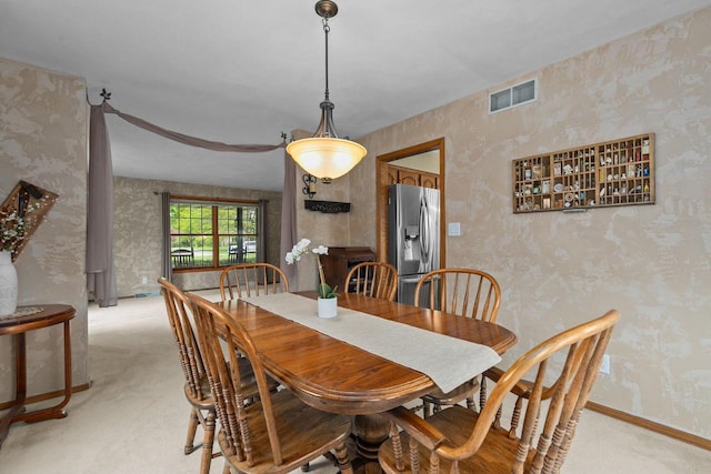 3226 W Twin Willow Ct, Appleton, WI 54914 - dining space featuring wallpapered walls, light carpet, and baseboards