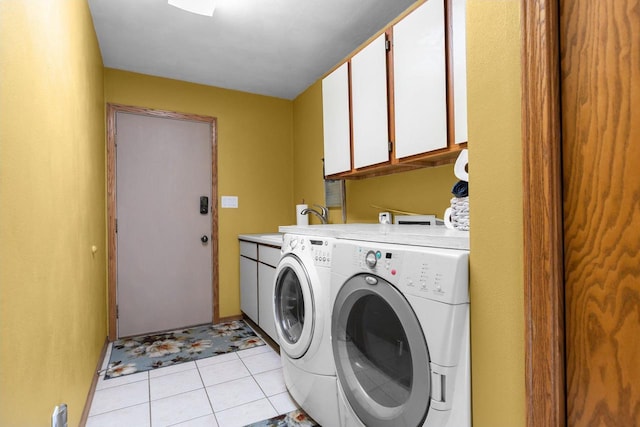 3226 W Twin Willow Ct, Appleton, WI 54914 - washroom featuring cabinet space, washing machine and dryer, and light tile patterned floors