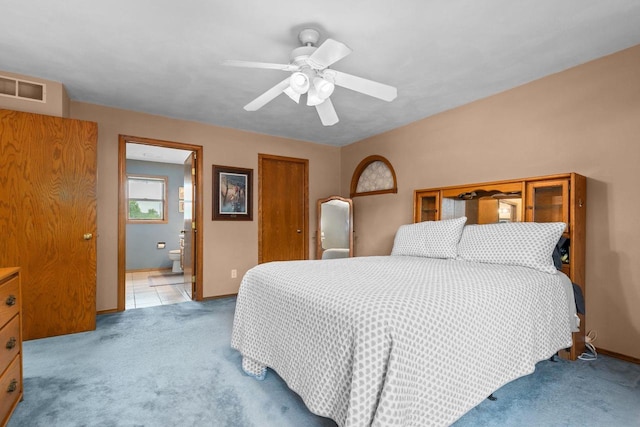 3226 W Twin Willow Ct, Appleton, WI 54914 - bedroom featuring carpet, baseboards, a closet, ensuite bathroom, and ceiling fan