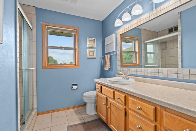 3226 W Twin Willow Ct, Appleton, WI 54914 - bathroom featuring toilet, tile patterned floors, a stall shower, and vanity