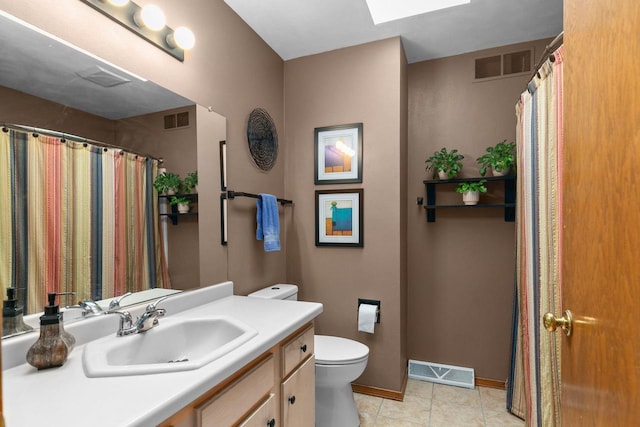 3226 W Twin Willow Ct, Appleton, WI 54914 - bathroom with toilet, vanity, tile patterned floors, baseboards, and curtained shower